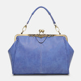 Multi-Tone Flared Gusset Vintage Framed Carry Vessel with Ornamental Metallic Kiss Lock Partitioned Inner Storage