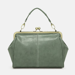 Multi-Tone Flared Gusset Vintage Framed Carry Vessel with Ornamental Metallic Kiss Lock Partitioned Inner Storage