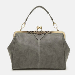 Multi-Tone Flared Gusset Vintage Framed Carry Vessel with Ornamental Metallic Kiss Lock Partitioned Inner Storage