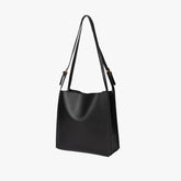 Solid Deep Black Minimalist Vertical Rectangular Shoulder Carry Tote with Warm Metallic Band Fixtures and Wide Open Top Storage Cavity Handbag